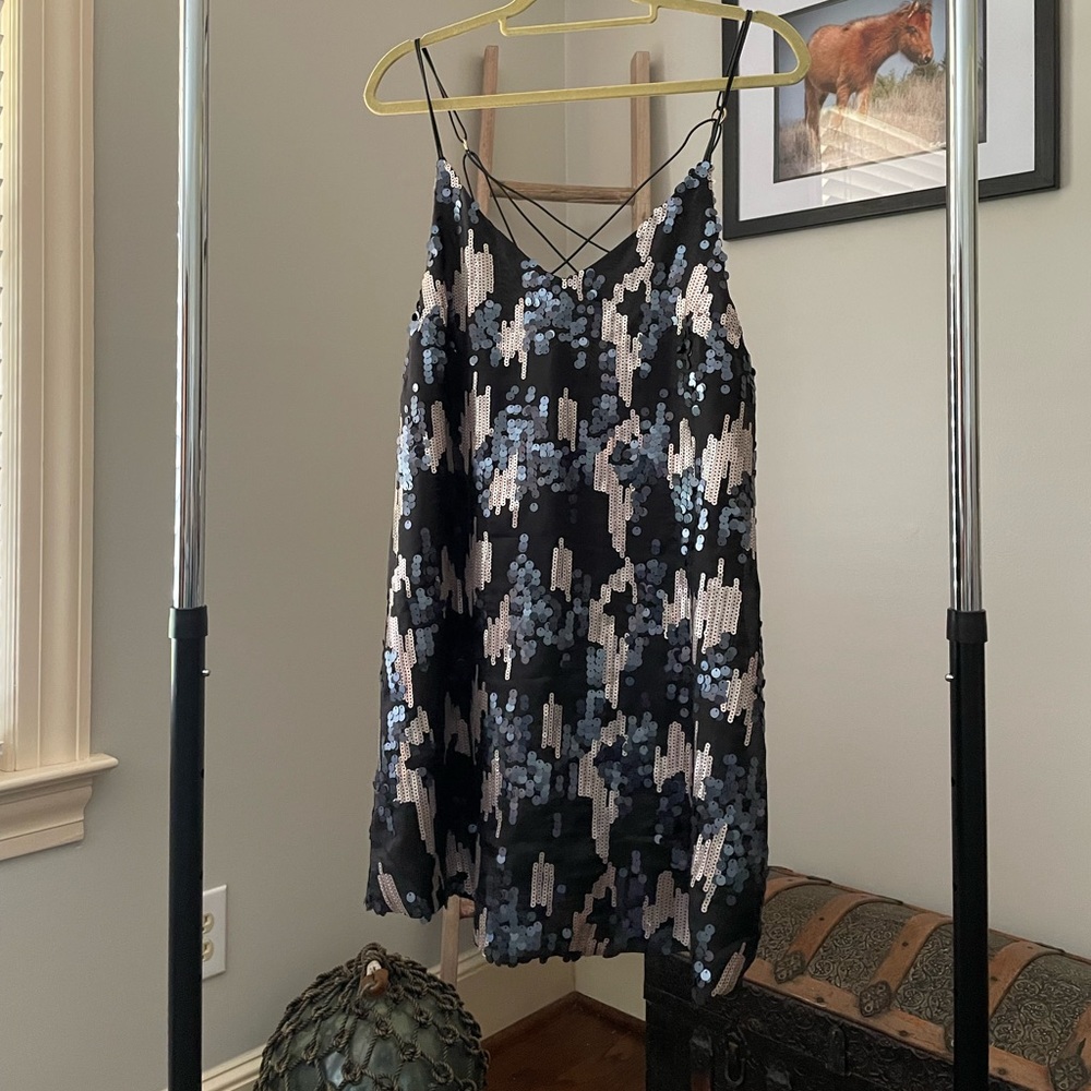 Blue and gold sequined black dress with cross detailed straps